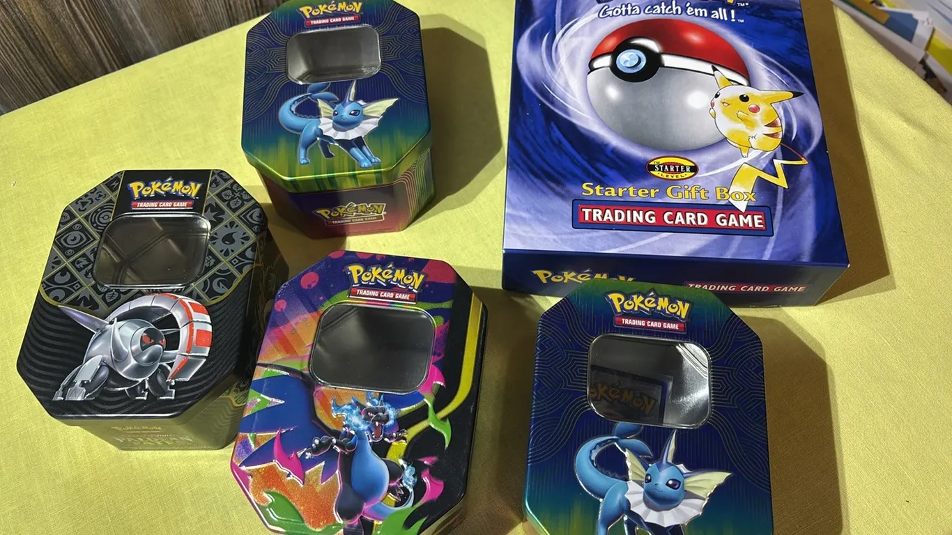 Pokemon card tins and game