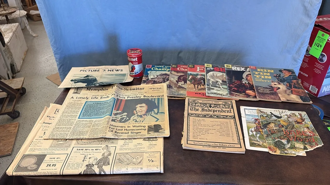 Newspaper Articles, Western Comic Books & Baking Powder Tin