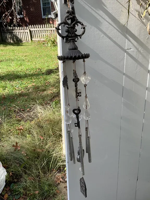 Decorative Metal and Crystal Wind Chime with Ornate Detail