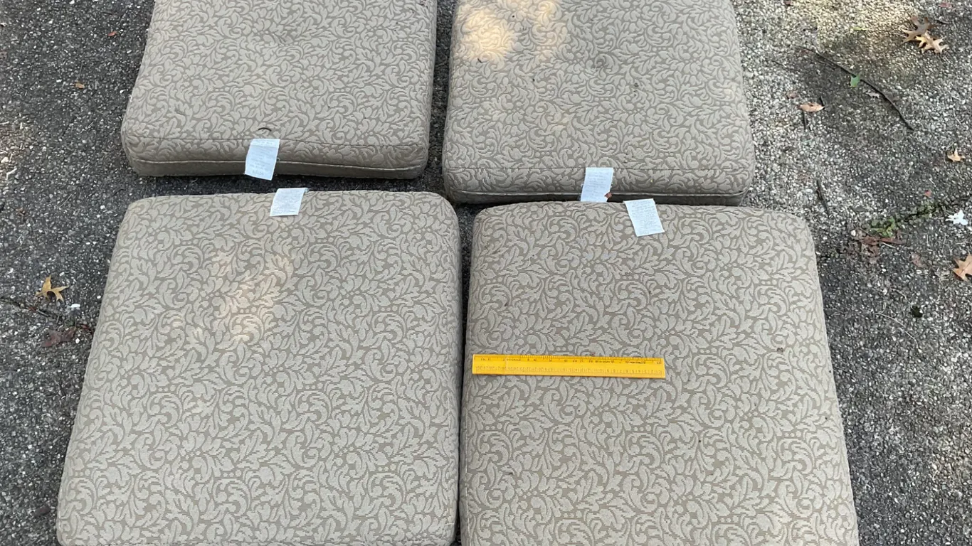 Four Beige Patterned Seat Cushions