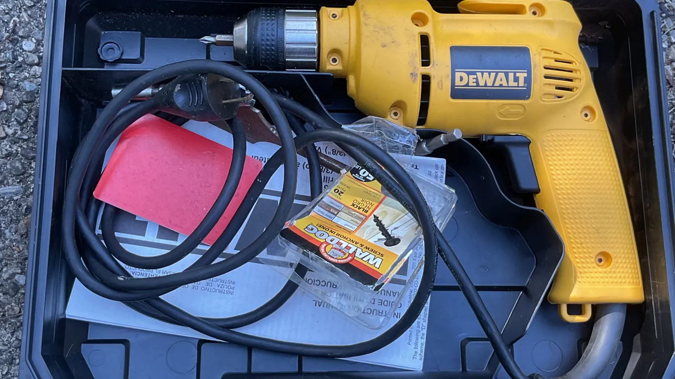 DeWalt Electric Drill with Case and Accessories