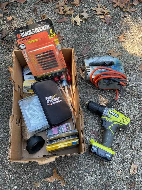 Power Tools and Accessories Including Ryobi Drill, Jigsaw, and Hardware