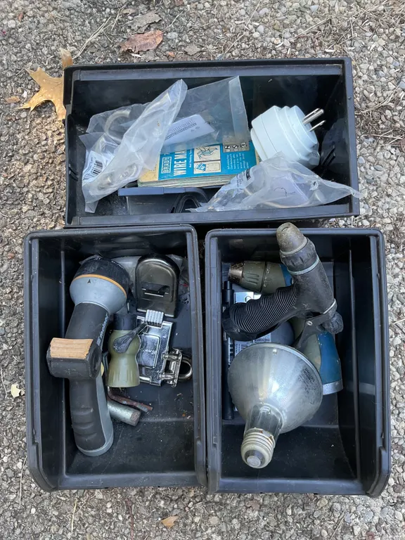 Household and Hardware Items in Plastic Bins