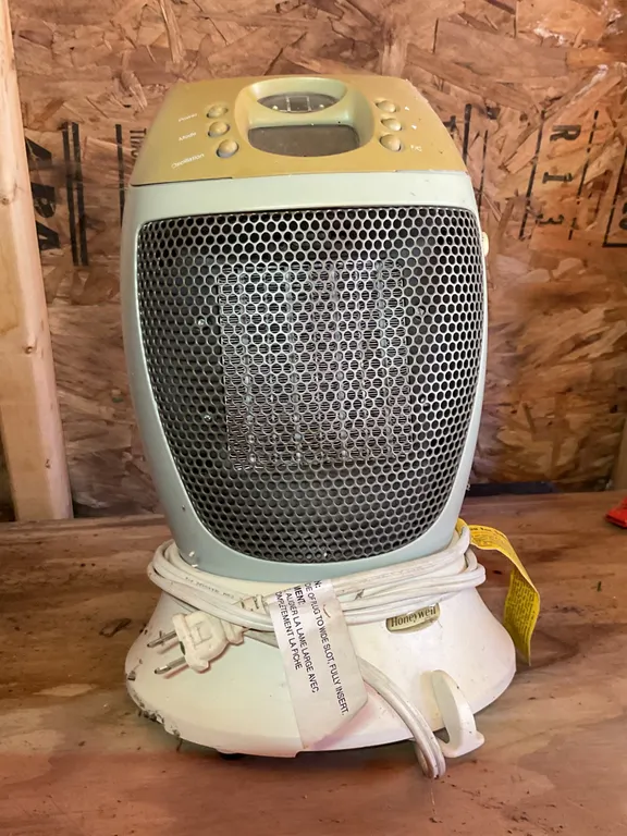 Two Portable Electric Heaters from Different Eras: Seabreeze Heat Sweep and Unbranded Modern Oscilla
