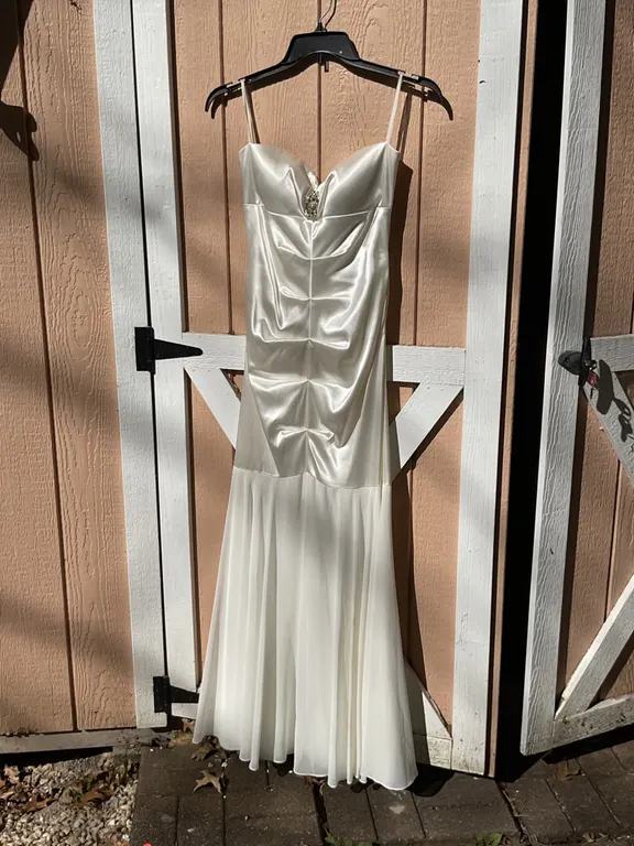 Two Formal Dresses: White Satin Juno Apparel and Black Layered Dress