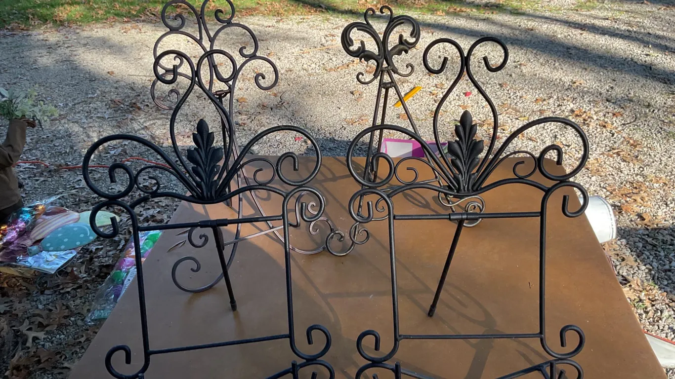 Four Decorative Wrought Iron Easels with Scrollwork Design