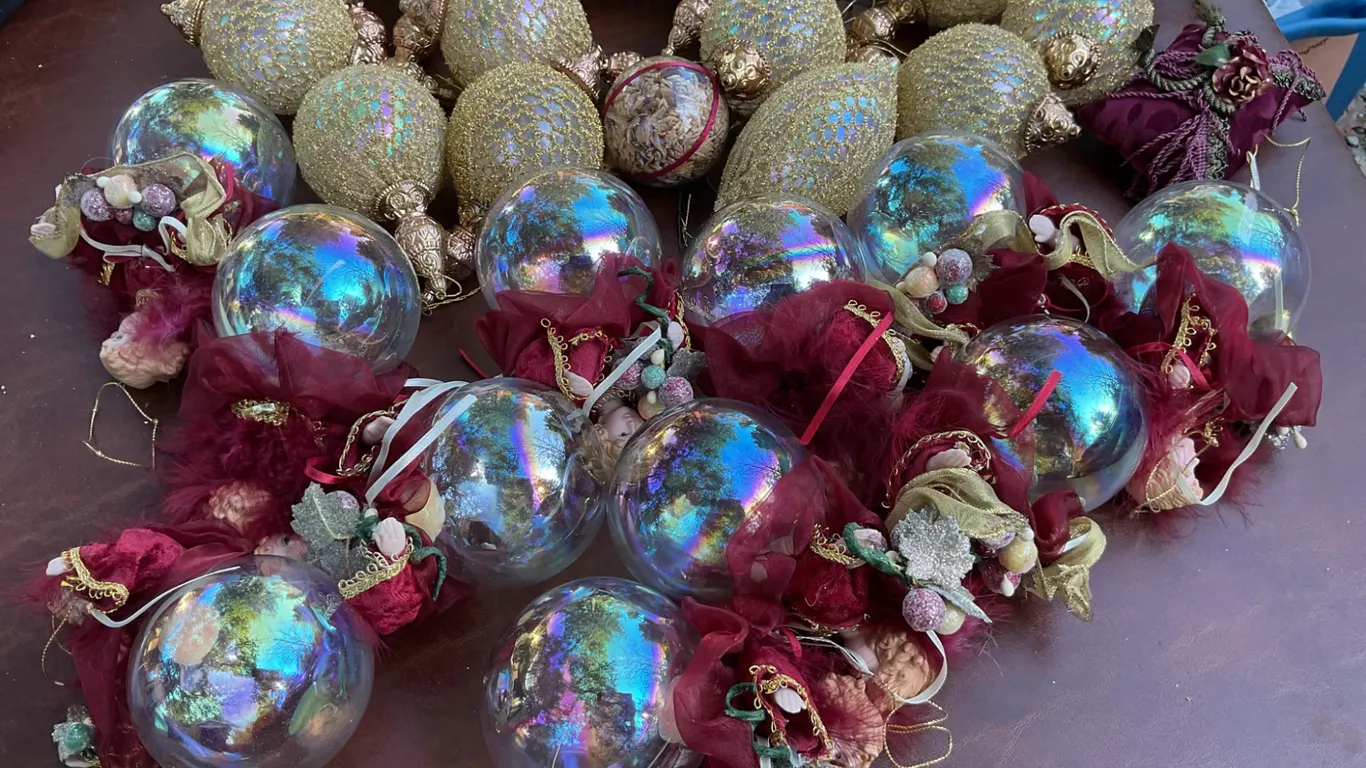 Christmas Ornaments Including Glass, Angel Figures, and Decorative Pieces