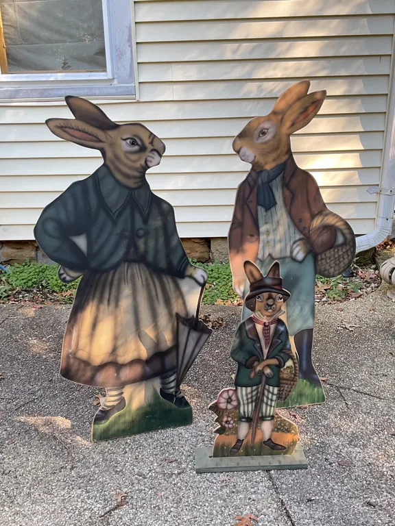 Three Hand-Painted Wooden Rabbit Figures in Period Attire