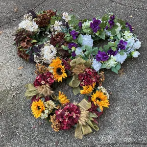Three Floral Wreaths Featuring Seasonal and Decorative Designs