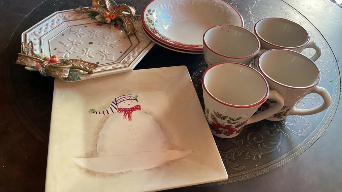 Holiday-Themed Dinnerware Including Plates, Bowls, and Mugs