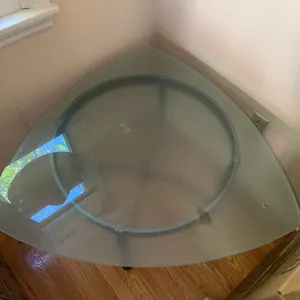 Glass table top with mismatched base