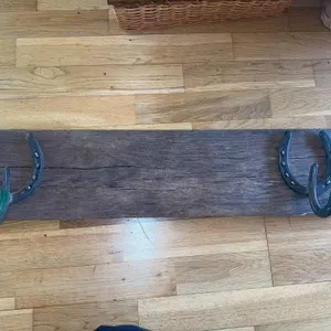 Rustic horseshoe coat rack