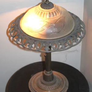 Ornate Metal Lamp With Glass Shade and Table