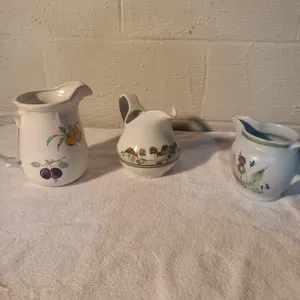 3 vintage pitchers