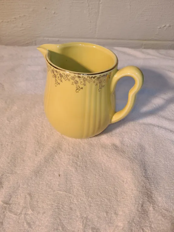 Halls superior quality kitchenware yellow pitcher