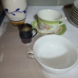 Vase, creamer, and 2 soup bowls
