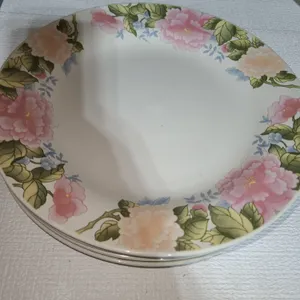 4 floral porcelain plates