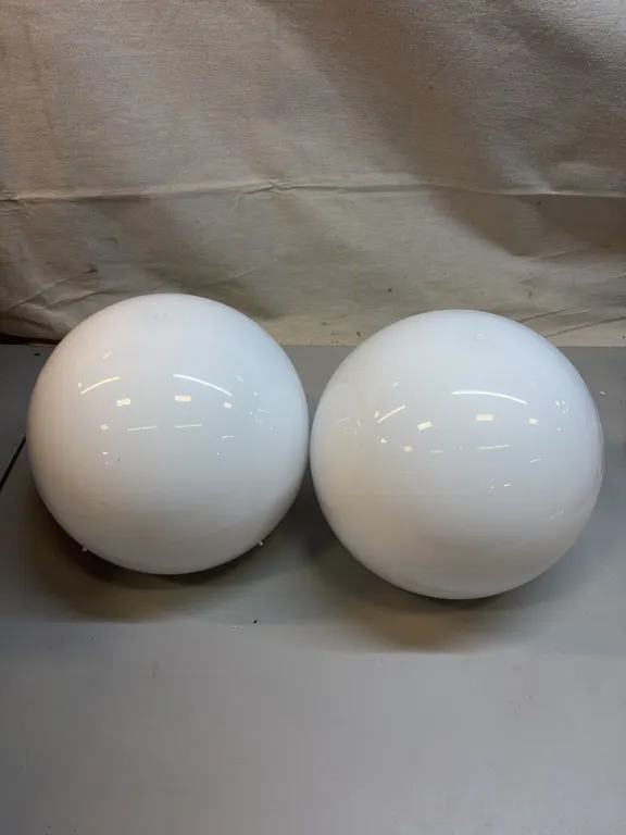 Two White Glass Globes