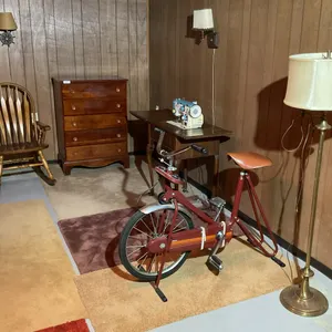 Dresser, exercise bike, floor lamp, chair, sewing machine