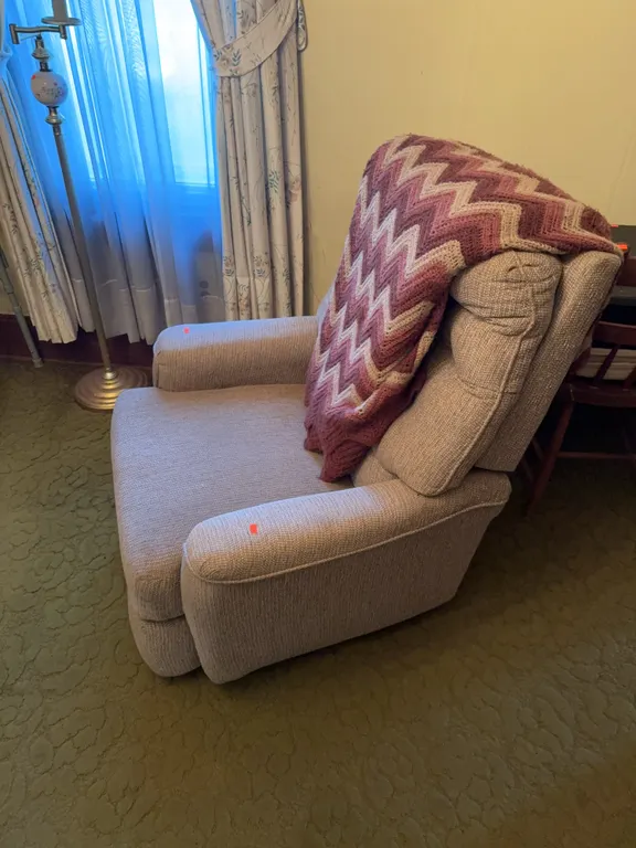 Reclining Upholstered Chair W/ Blanket