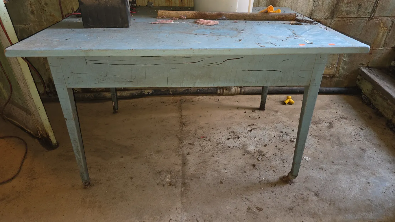 Blue wood table (no contents)