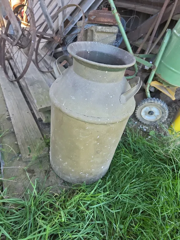 Milk can ( has holes in bottom)