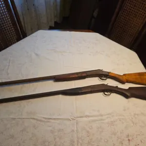 2 single shot shotguns ( rusty)