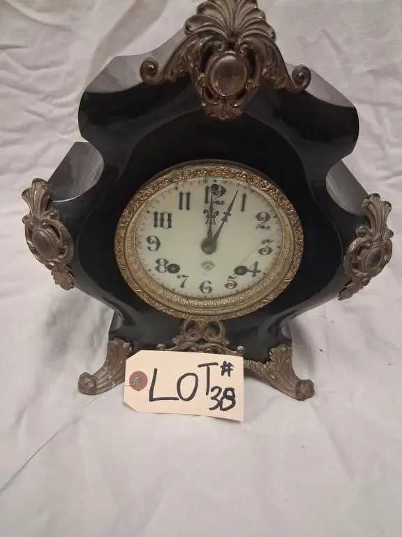 Ornate Black Mantel Clock with Gilt Mounts