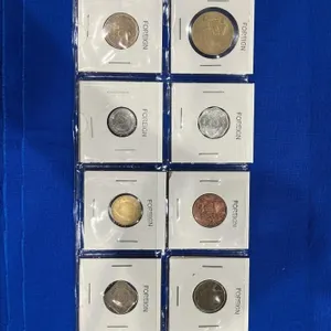 Collection of 8 Assorted Foreign Coins