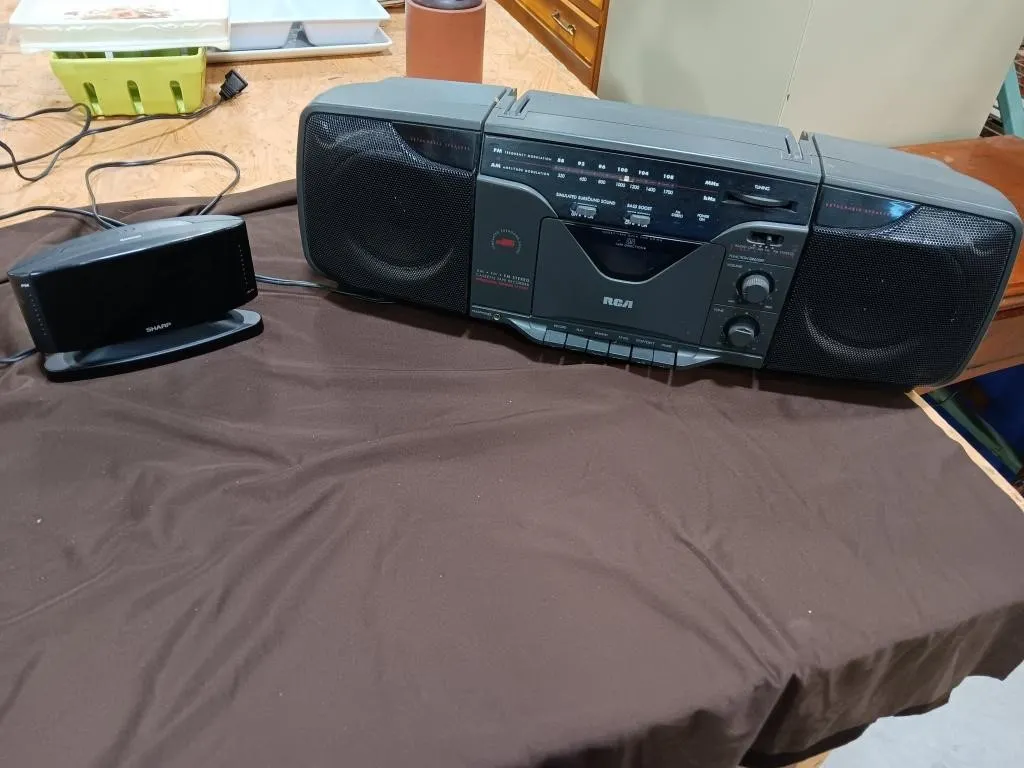 Rca radio with detachable speakers and Sharp