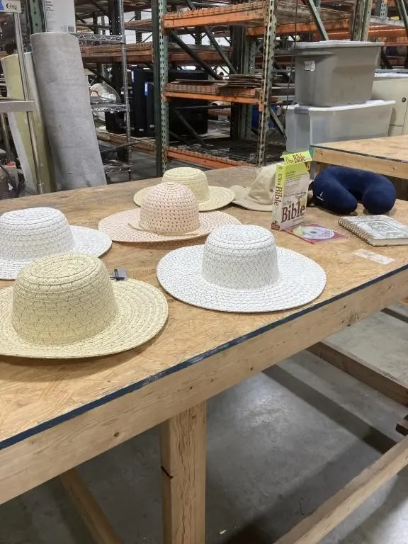 Ladies hats, neck pillow, journal, and Bible CD