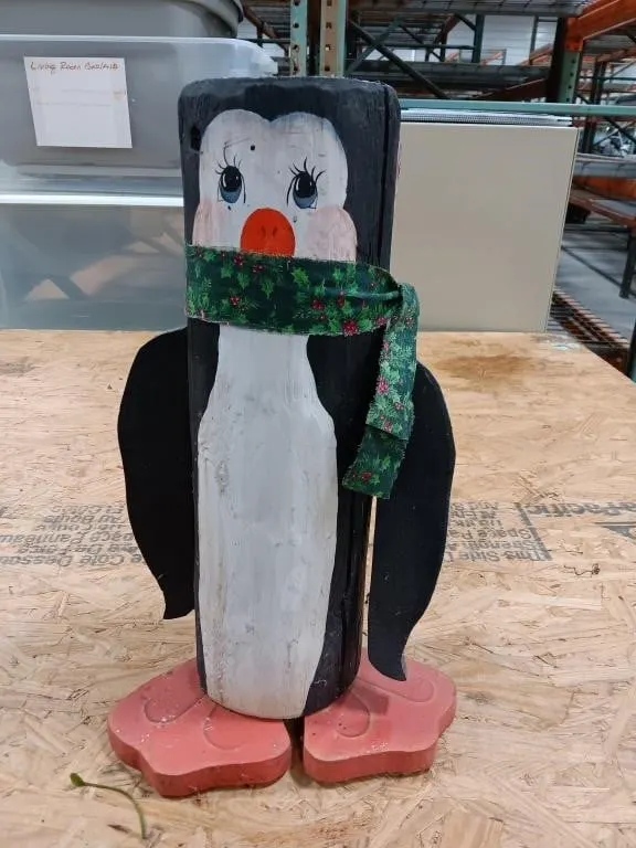 Wooden penguin, arms swivel. Approximately 17"