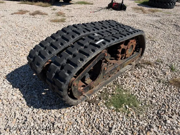 Skid steer bolt-on tracks