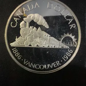 1986 Canada Vancouver Dollar Coin, 23g .500 Silver, Steam Locomotive, Elizabeth II
