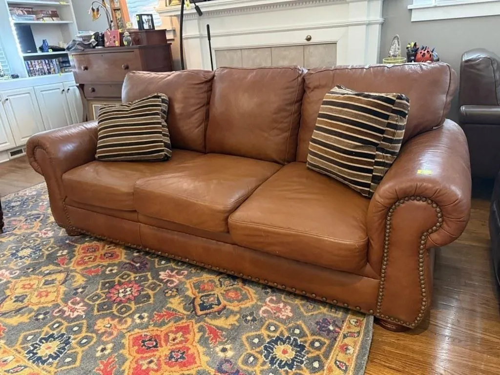 Leather sofa, throw pillows