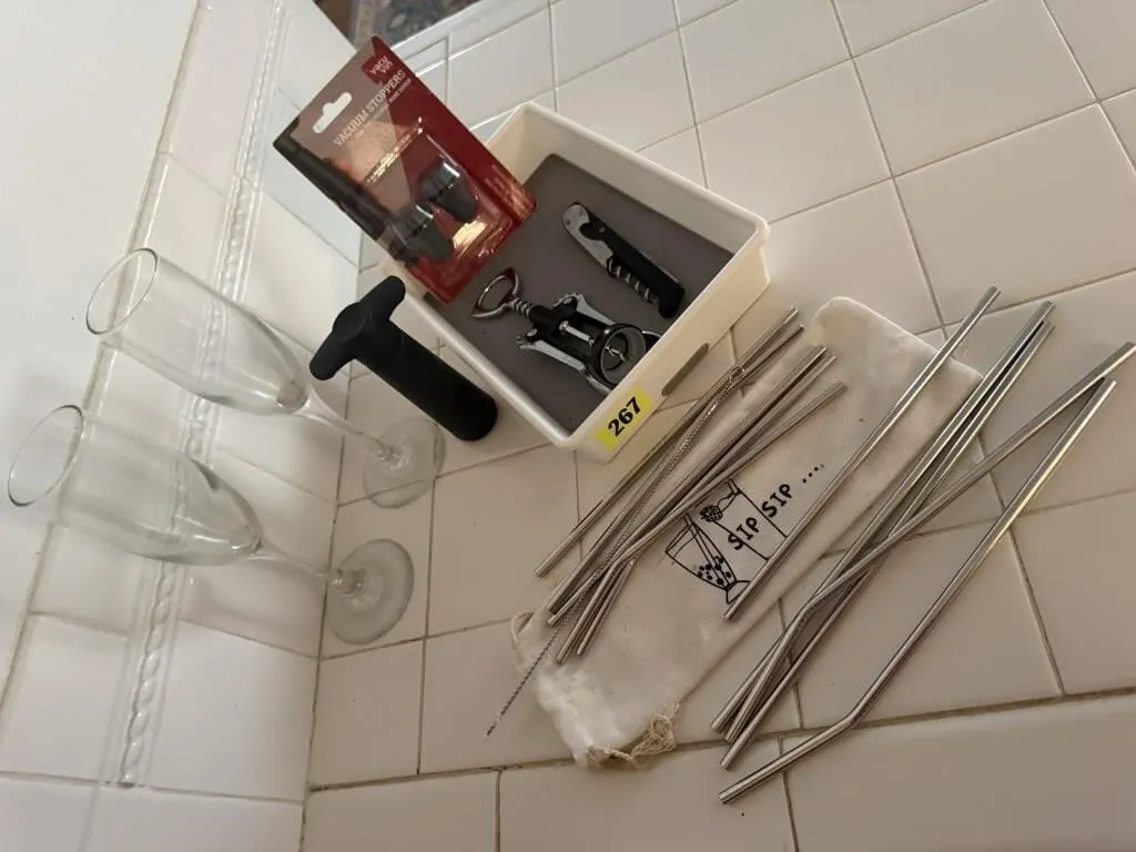 Corkscrews, wine stoppers, champagne flutes,