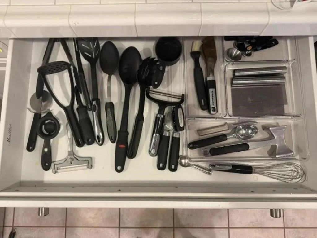Contents of kitchen utensil drawer, organizers