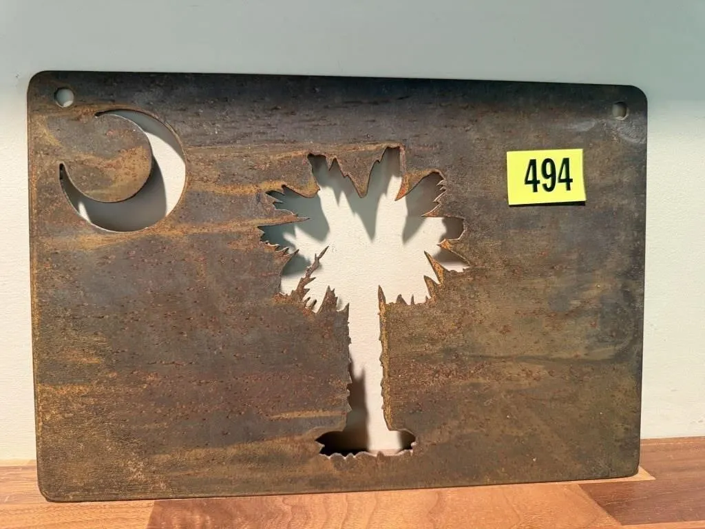 Rustic metal palm tree sign