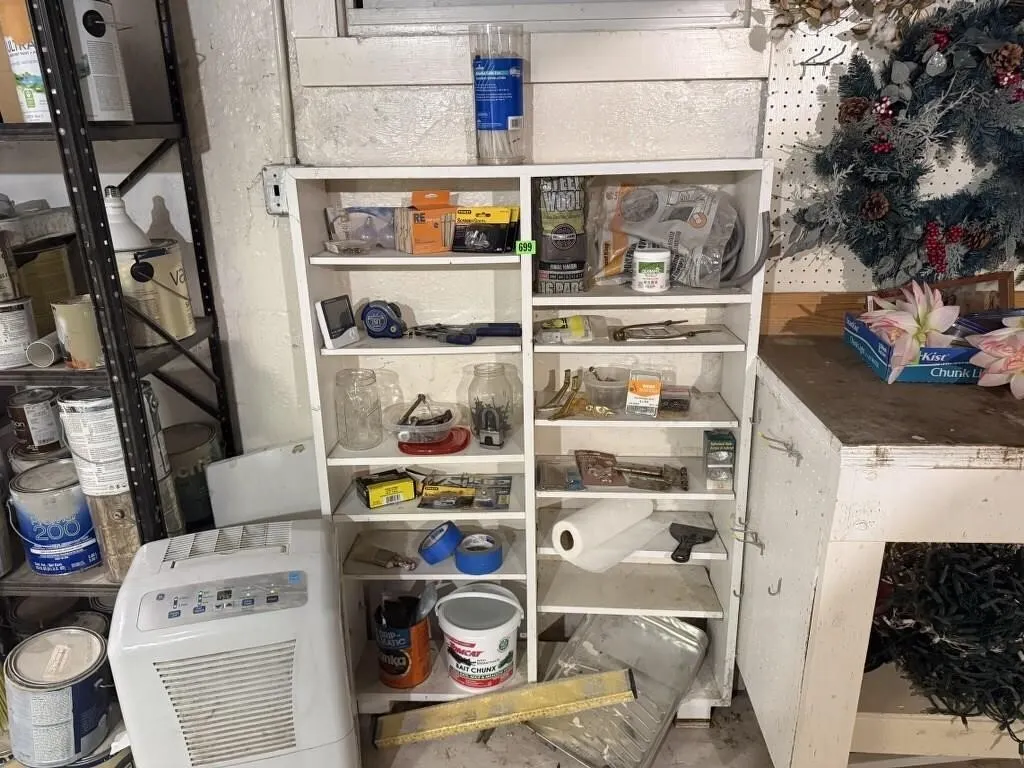 Storage shelves of tools, hardware, adhesives,