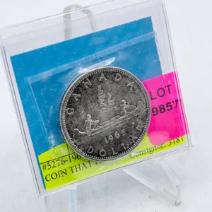 #5276-1965 GRADED $1.00 SILVER COIN THAT HAS A