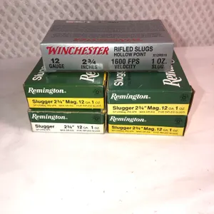 Remmington and Winchester Rifled Slugs, Five Full Boxes and Four Loose Shells