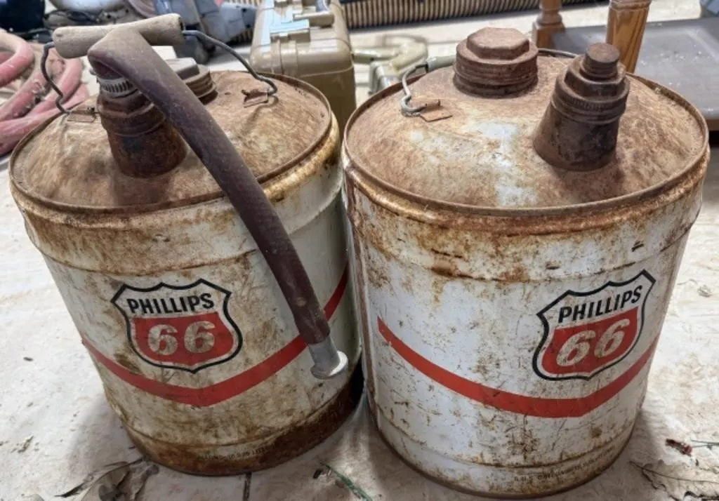 2 Vintage Empty Phillips 66 Cans