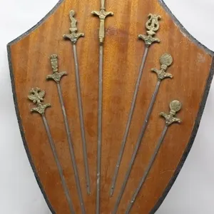 Seven Decorative Letter Openers on Shield-Shaped