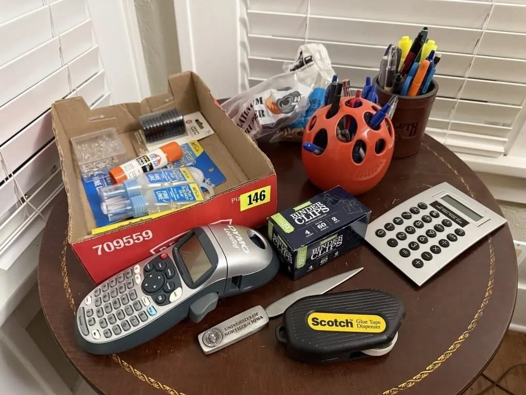 Office supplies, calculator, label maker, binder