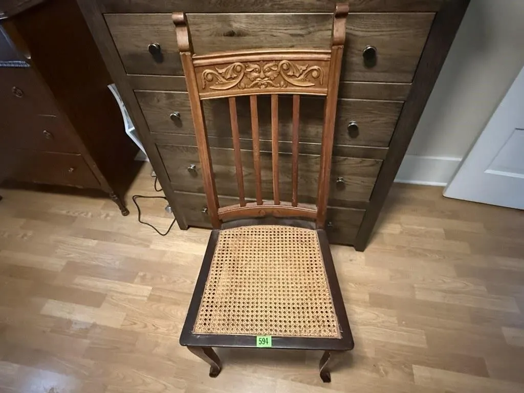Caned carved back dining chair