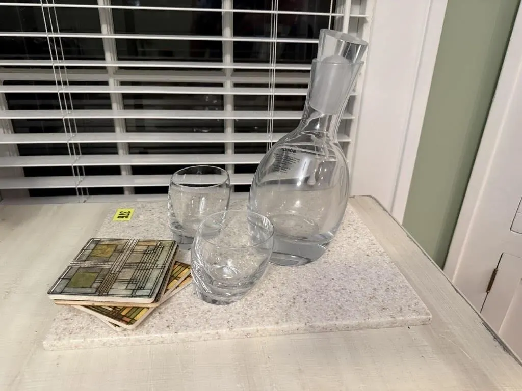 Marble cutting board, Nambe crystal decanter,