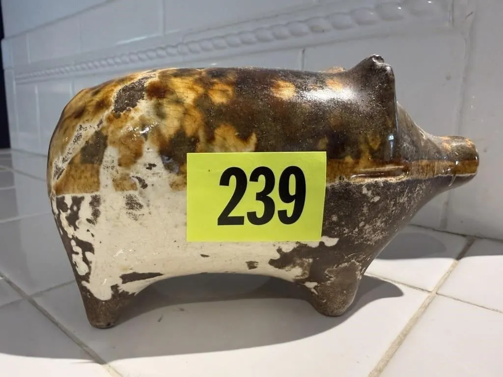 Distressed pottery piggy bank