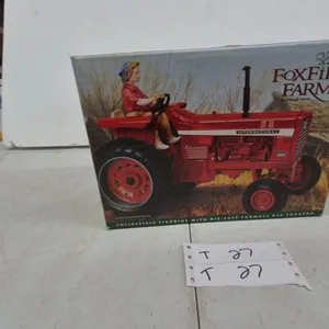 Ertl Foxfire Farm Miss Charlotte #6 Figurine with Die-Cast Farmall 826 Tractor by Lowell Davis