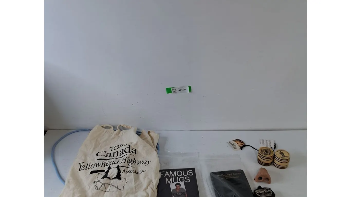 Trans-Canada Carry Bag, (2) Short Ethernet Cables, (2) Captain Morgan Souvenirs, (2) Books, Misc