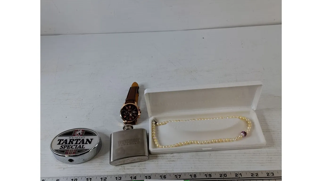 Younger's Tartan Special Tap Handle, Windsor Flask, Geneva Wristwatch and Pearl Necklace